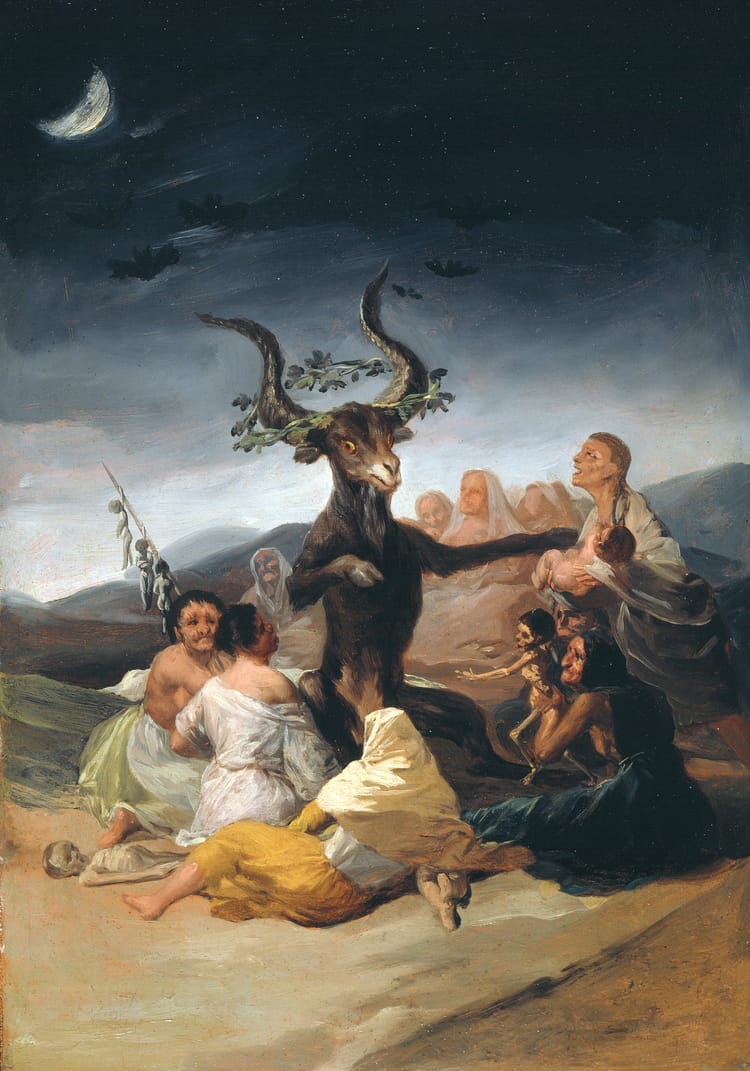 A painting. A humanoid goat is crowned with leaves and surrounded by old women with distorted faces, bearing dead infants.
