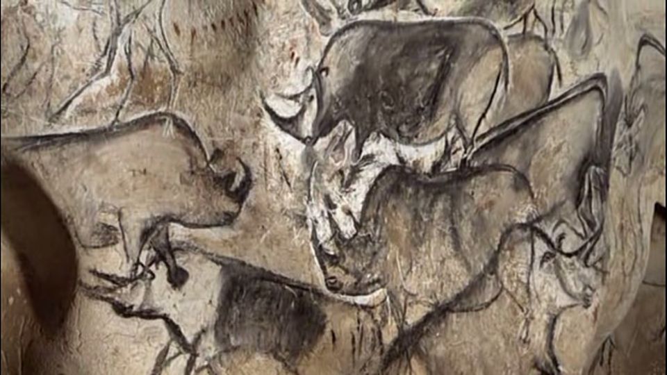 An extremely vivid Upper Paleolithic cave painting, largely illustrating animals that look like rhinos.