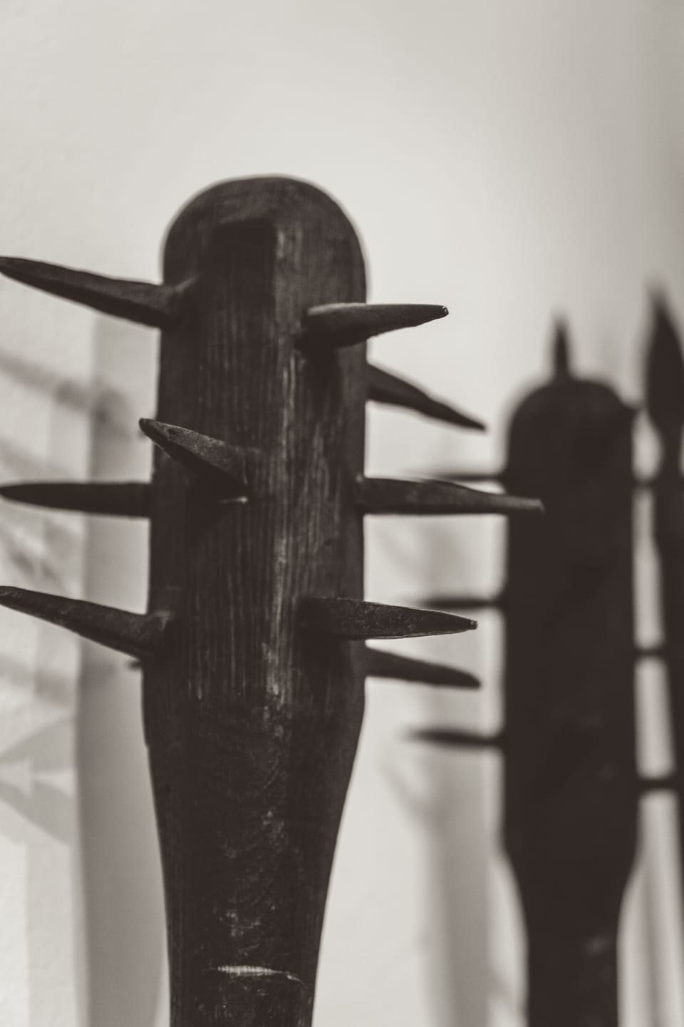 Nasty, dark wooden club-like objects with sharpened spikes protruding from the top.